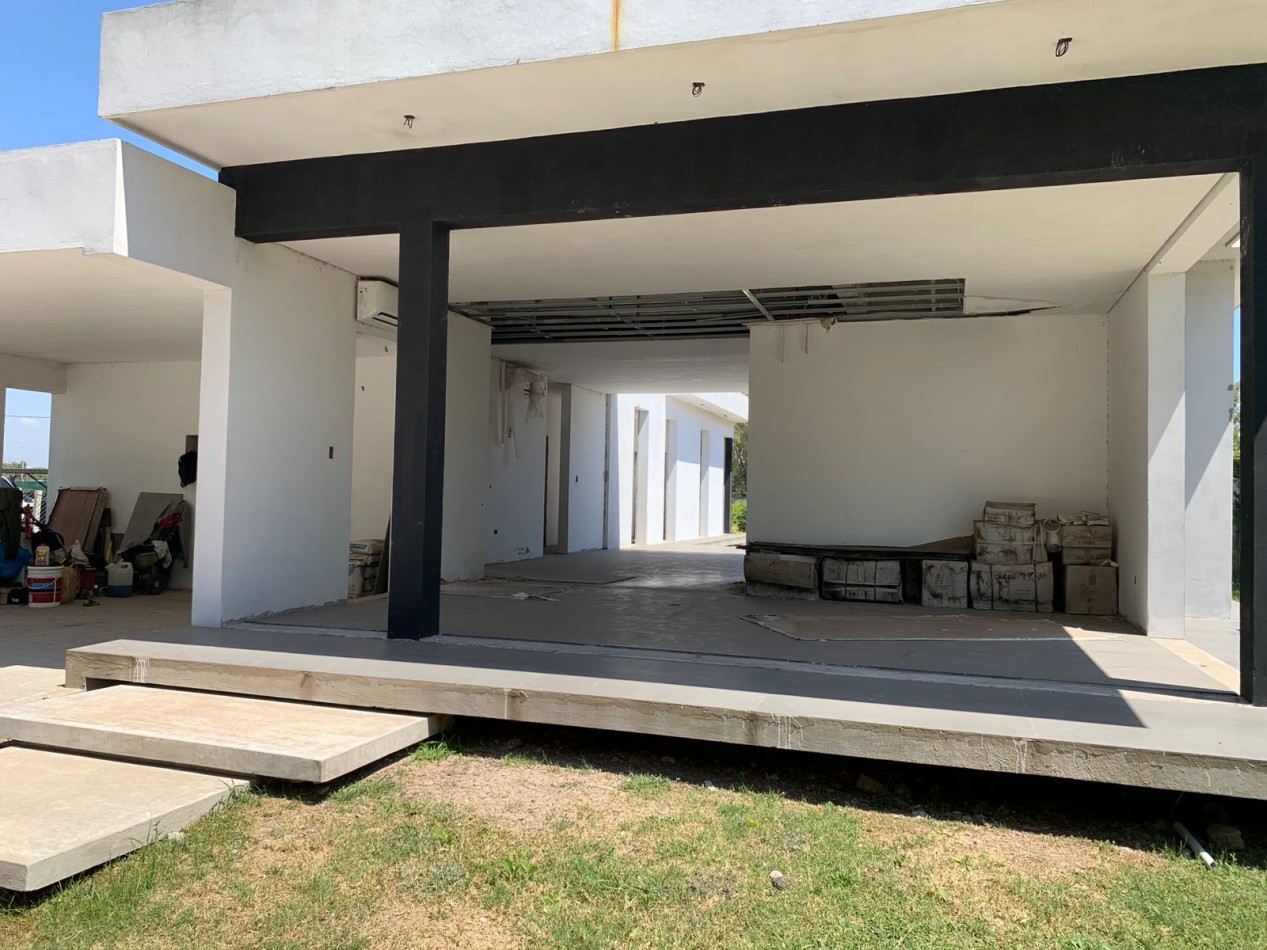 AZ- APTO CREDITO- CASA A TERMINAR en B° BARRANCAS de IRAOLA