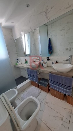 Venta departamento moderno 2 ambientes con cochera cubierta