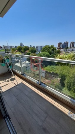 Venta departamento moderno 2 ambientes con cochera cubierta