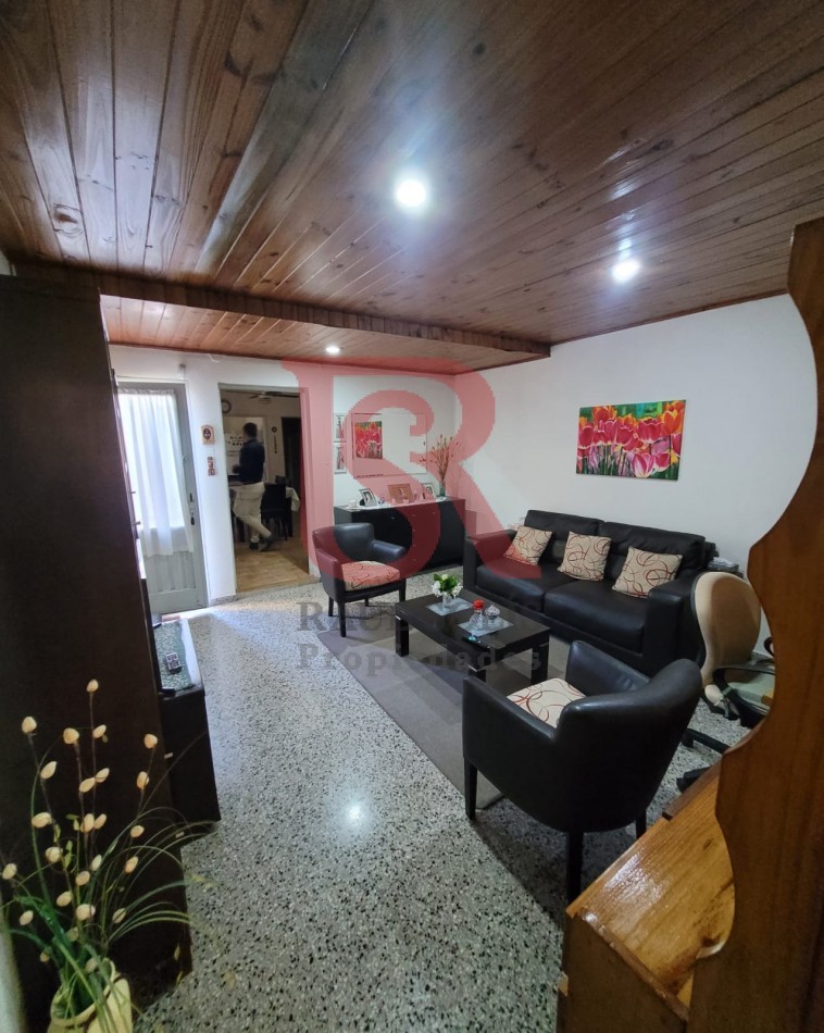 ES. PH AL FRENTE 4 AMBIENTES CON COCHERA Y JARDIN CON PARRILLA - APTO CREDITO-